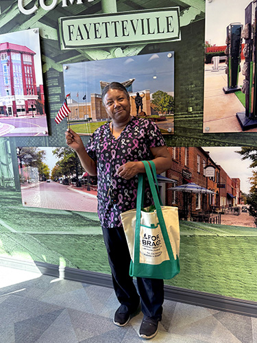 Happy member with gift