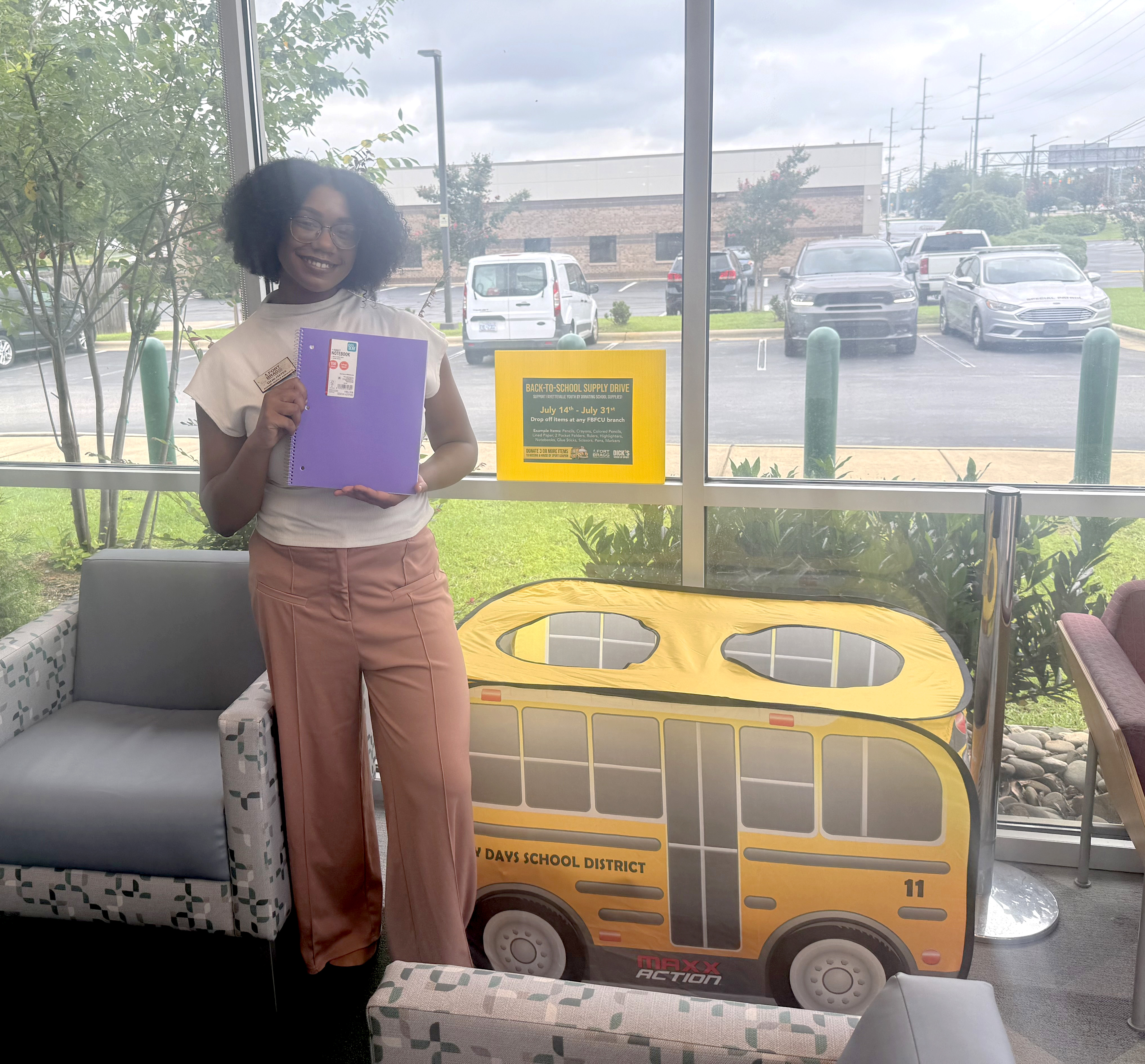 FBFCU Employee with notebook