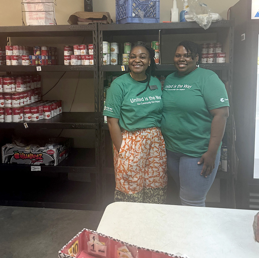 FBFCU Employees volunteering at Fayetteville Urban Ministry's Food Pantry