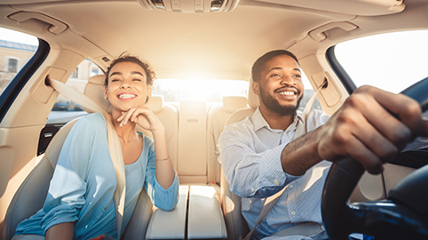 Couple driving in car