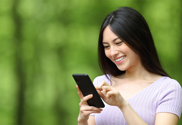 person holding phone while scrolling